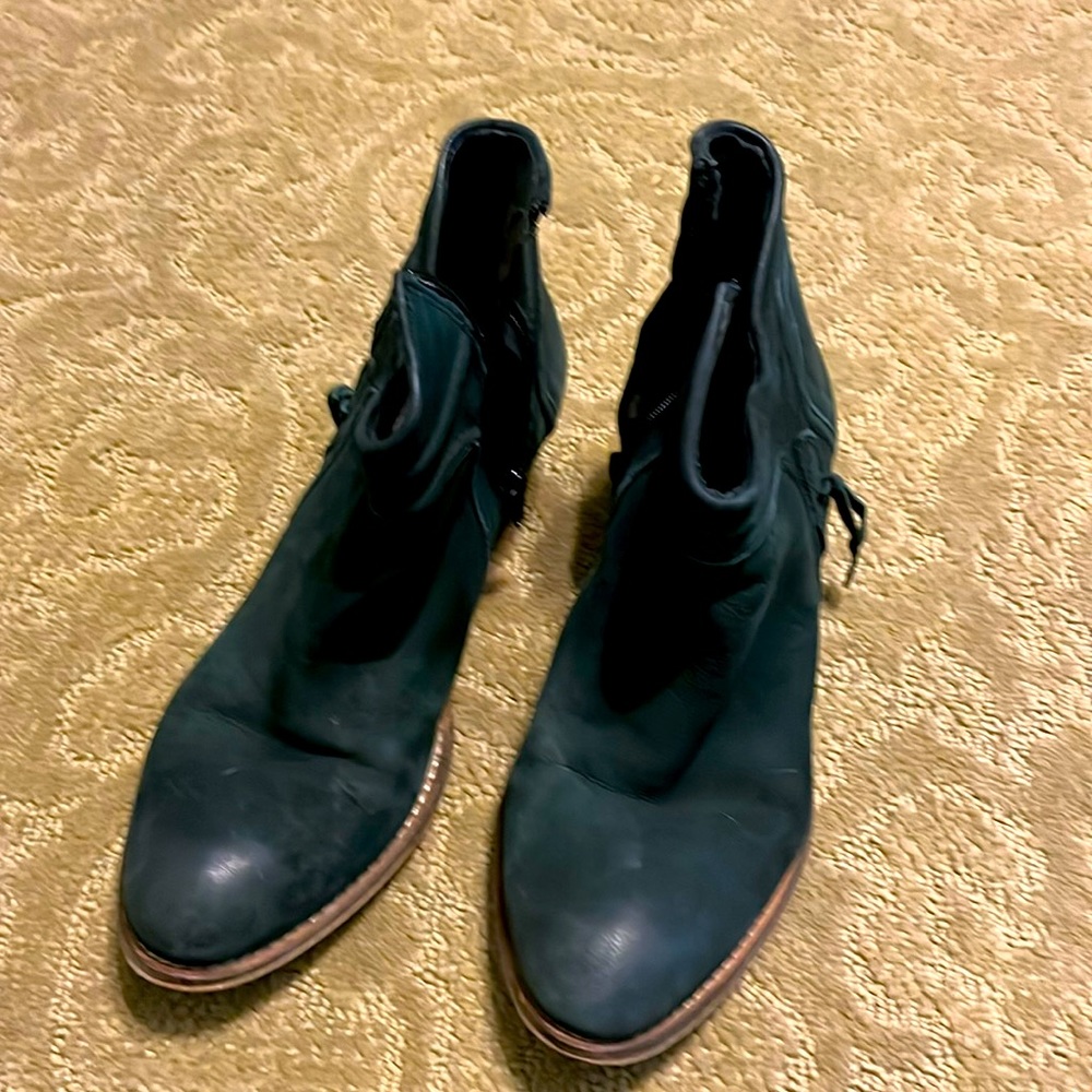 Black leather booties. Cute and comfy. Smoke free home.